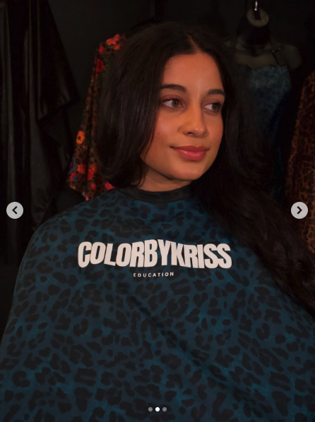 ColorByKriss branded teal leopard-print salon cape close up